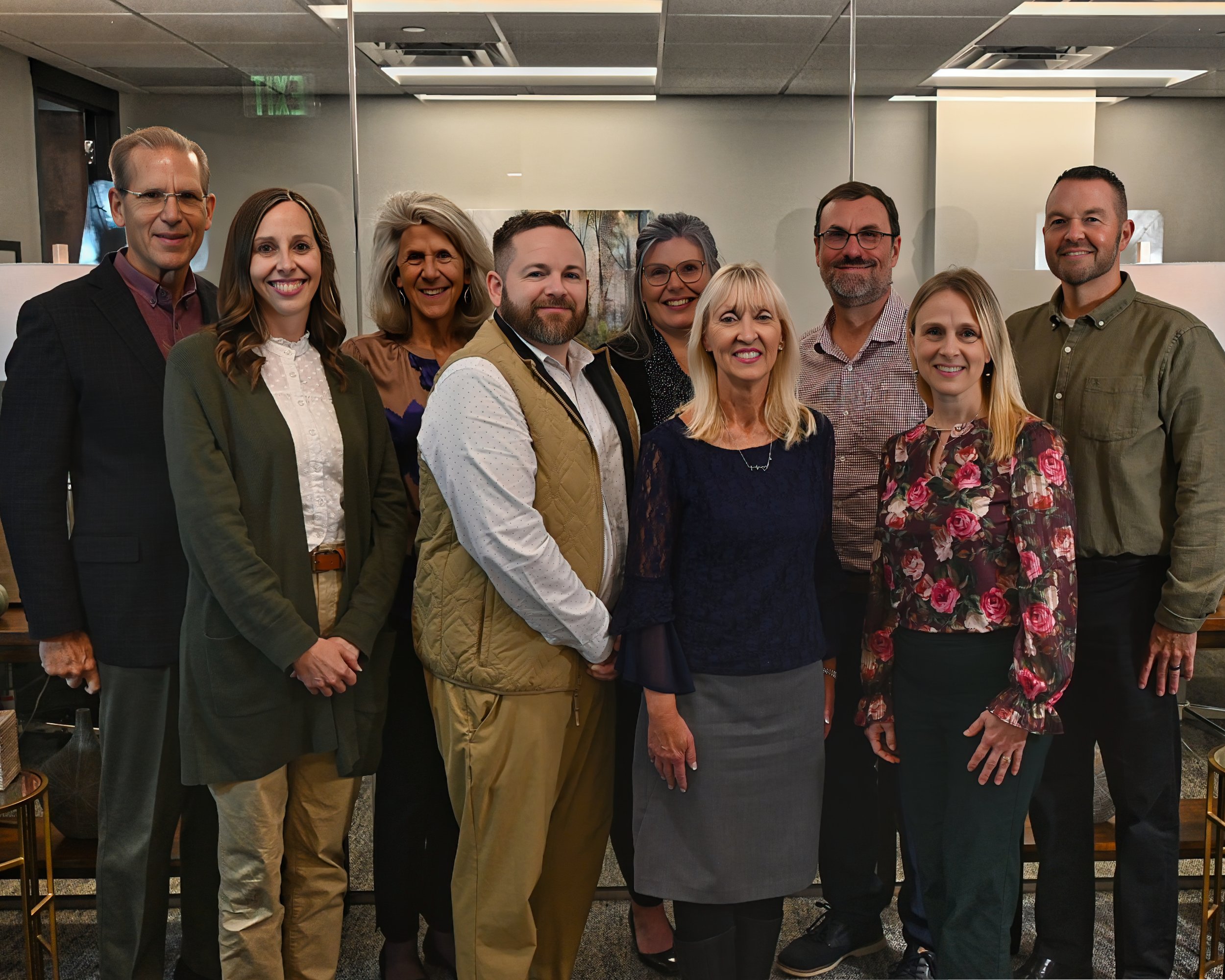 October 2025 -  Team Gathering Photo : “Rock House Center team gathered with John Shaw during his visit” 